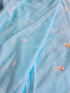 Mulmul Cotton Saree x Embroidered Flowers x Contrast Tassels : Baby Blue