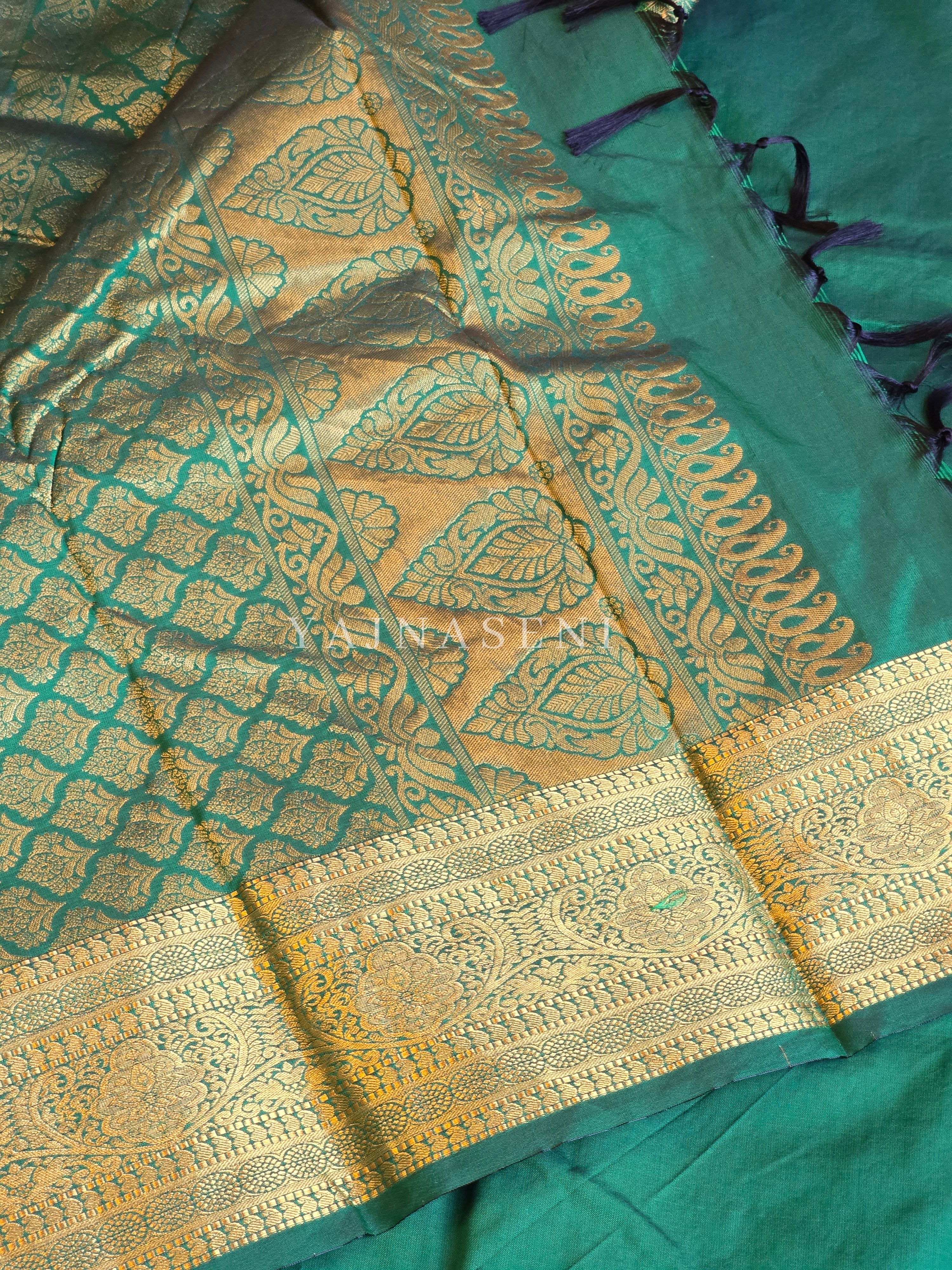 Semi Soft Silk Gold Zari Saree - Bottle Green