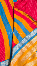 Load image into Gallery viewer, Georgette x Gold Zari Saree - Red x Blue x Deep Yellow

