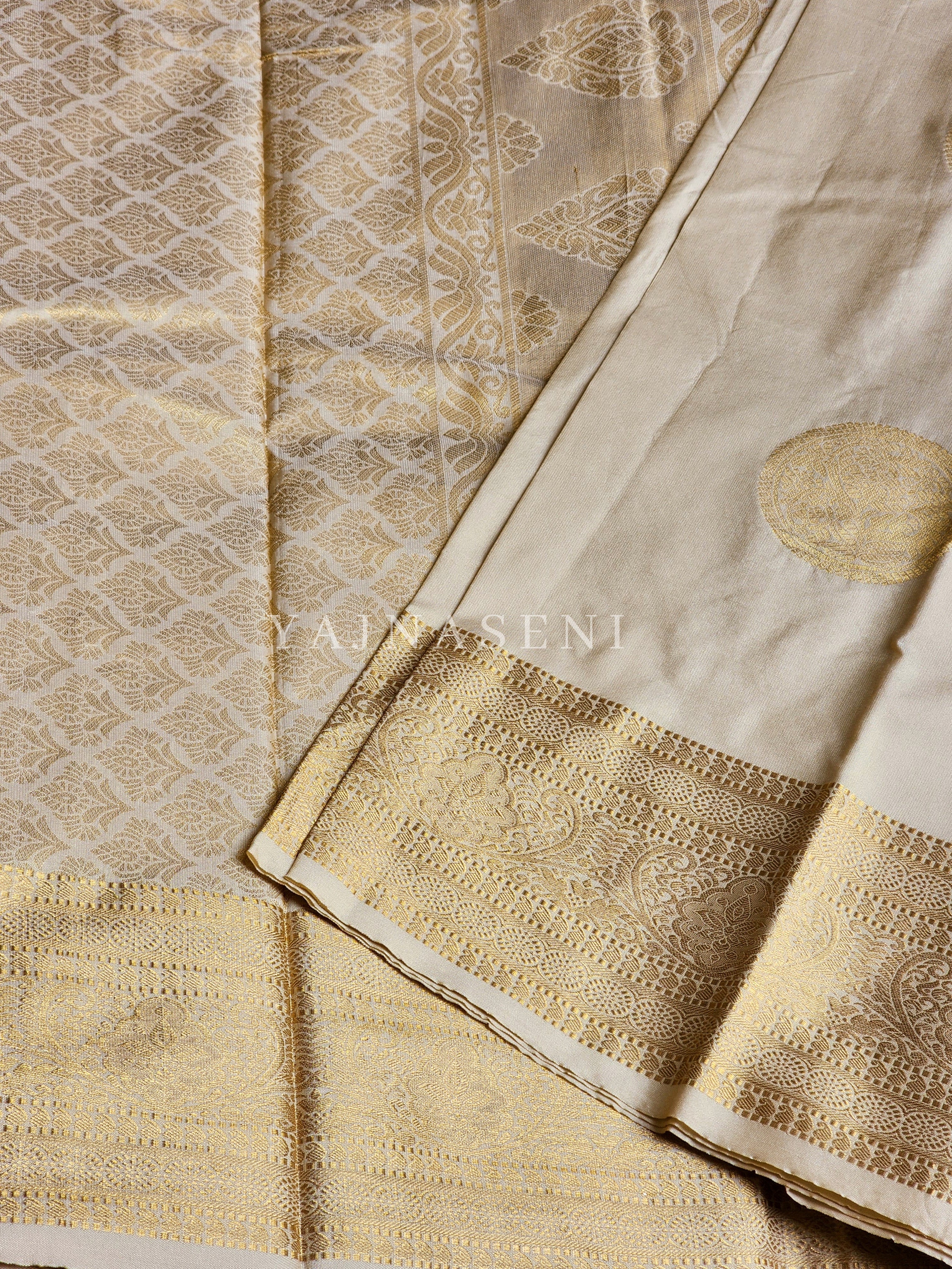 Semi Soft Silk Gold Zari Saree - Cream