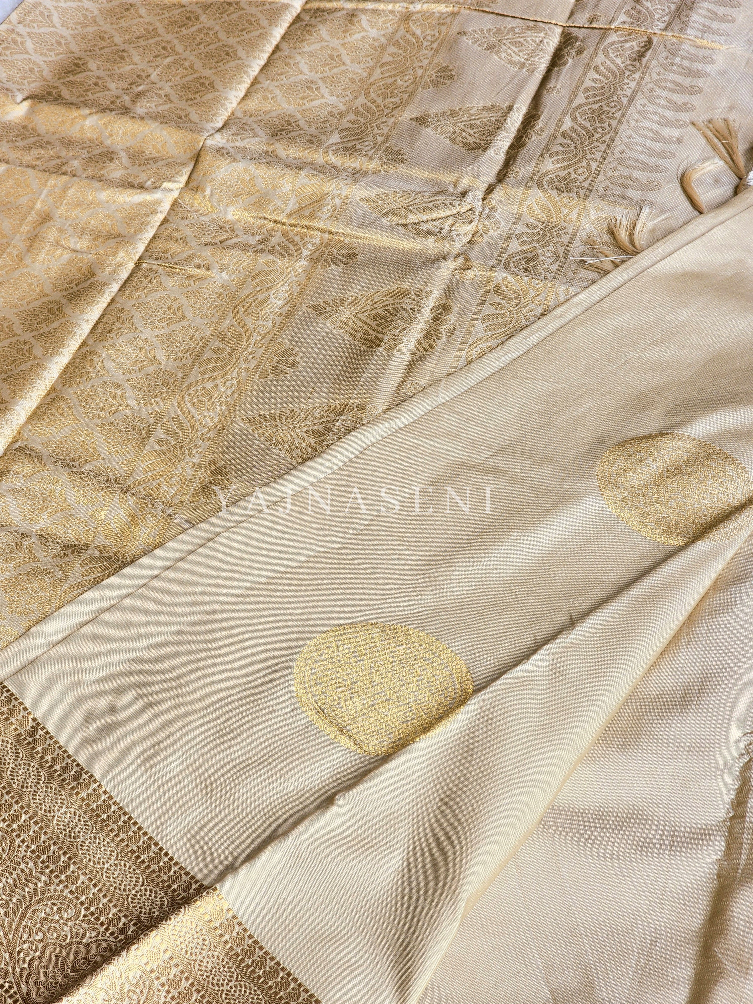 Semi Soft Silk Gold Zari Saree - Cream