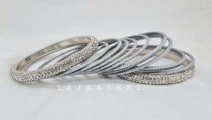 Silver bangles with White stones