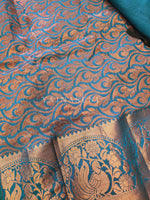 Load image into Gallery viewer, Kanchi semi soft silk x Copper zari saree - Teal
