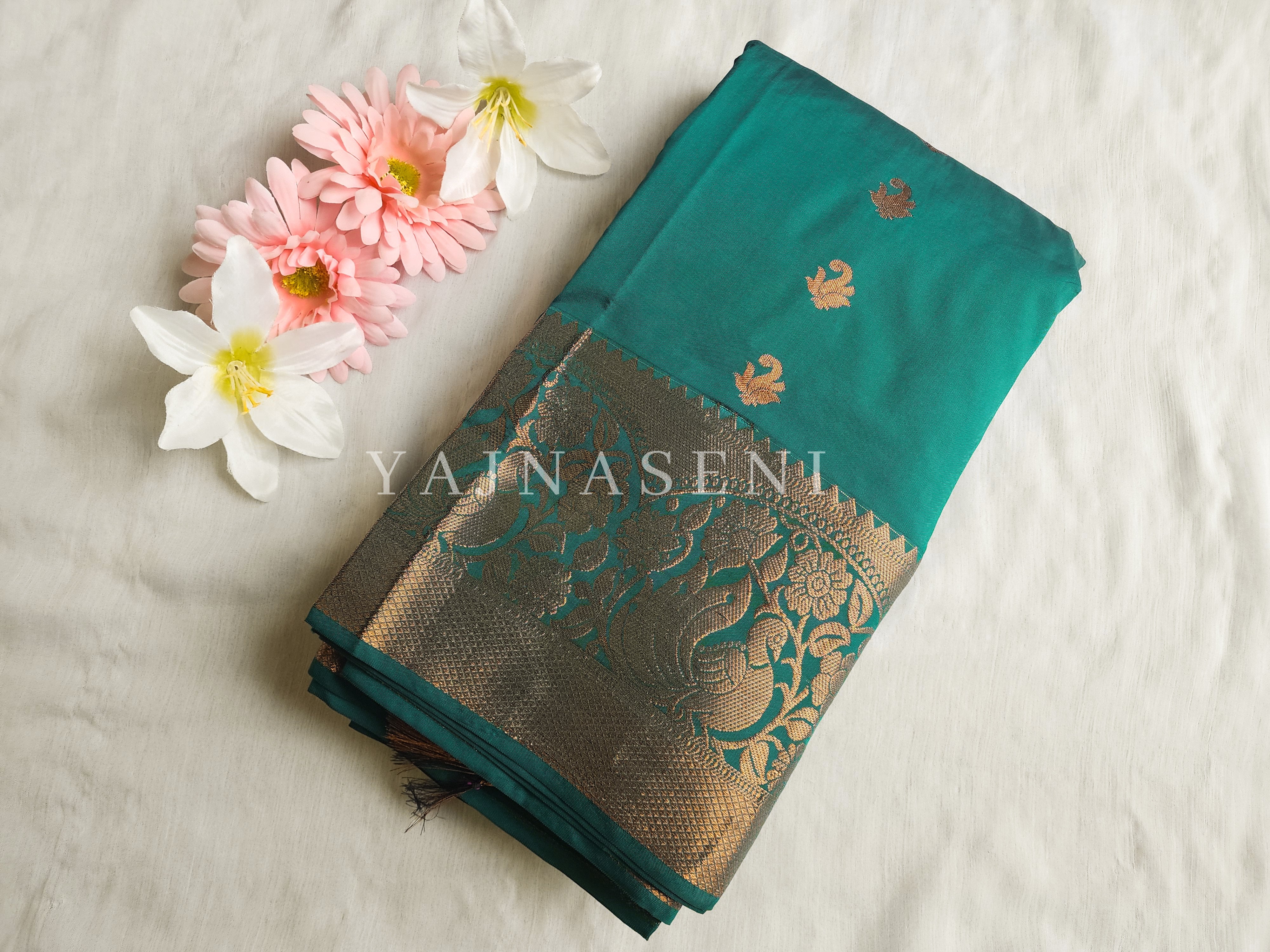 Kanchi semi soft silk x Copper zari saree - Green