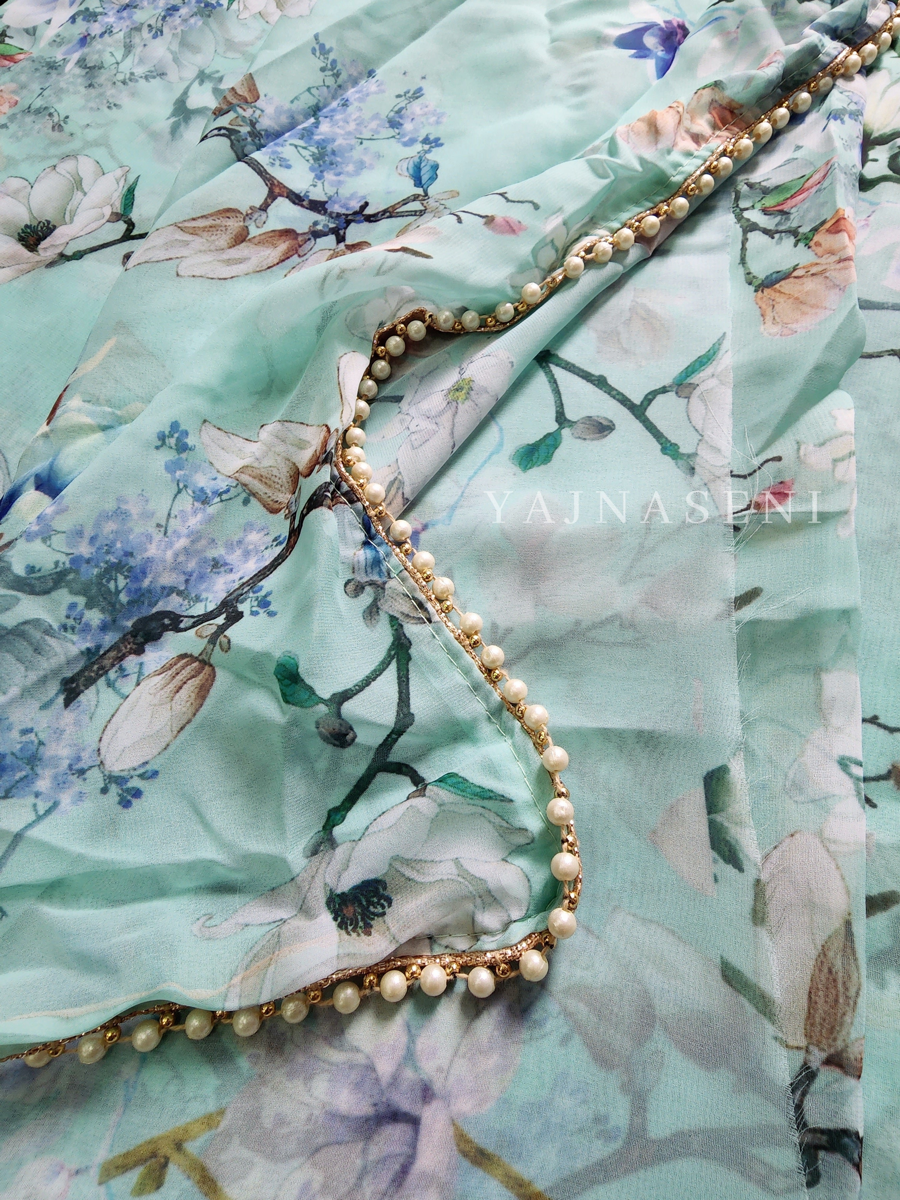 Floral georgette saree x Pearl border : Turquoise